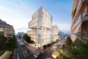 GATEWAY BUSINESS: A high-rise mixed-use building with contemporary office space and retail stores.